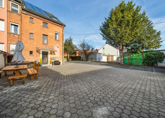 Suiteable Living - Boardinghaus mit Parkplätzen, WLAN und Waschraum