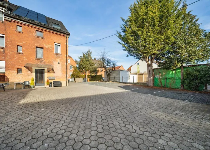 Suiteable Living - Boardinghaus mit Parkplätzen, WLAN und Waschraum