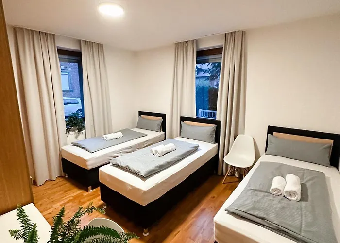 Suiteable Living - Boardinghaus mit Parkplätzen, WLAN und Waschraum